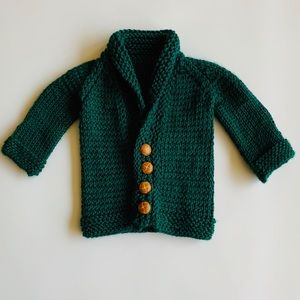 Green knit baby cardigan